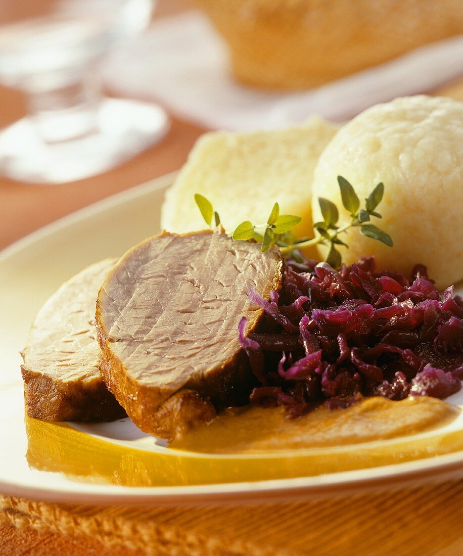 Wild boar with red cabbage and potato dumplings
