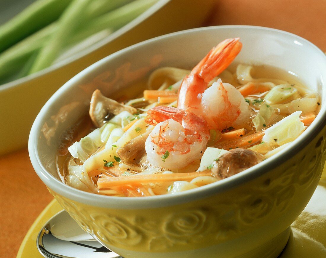Colourful noodle soup with shrimps