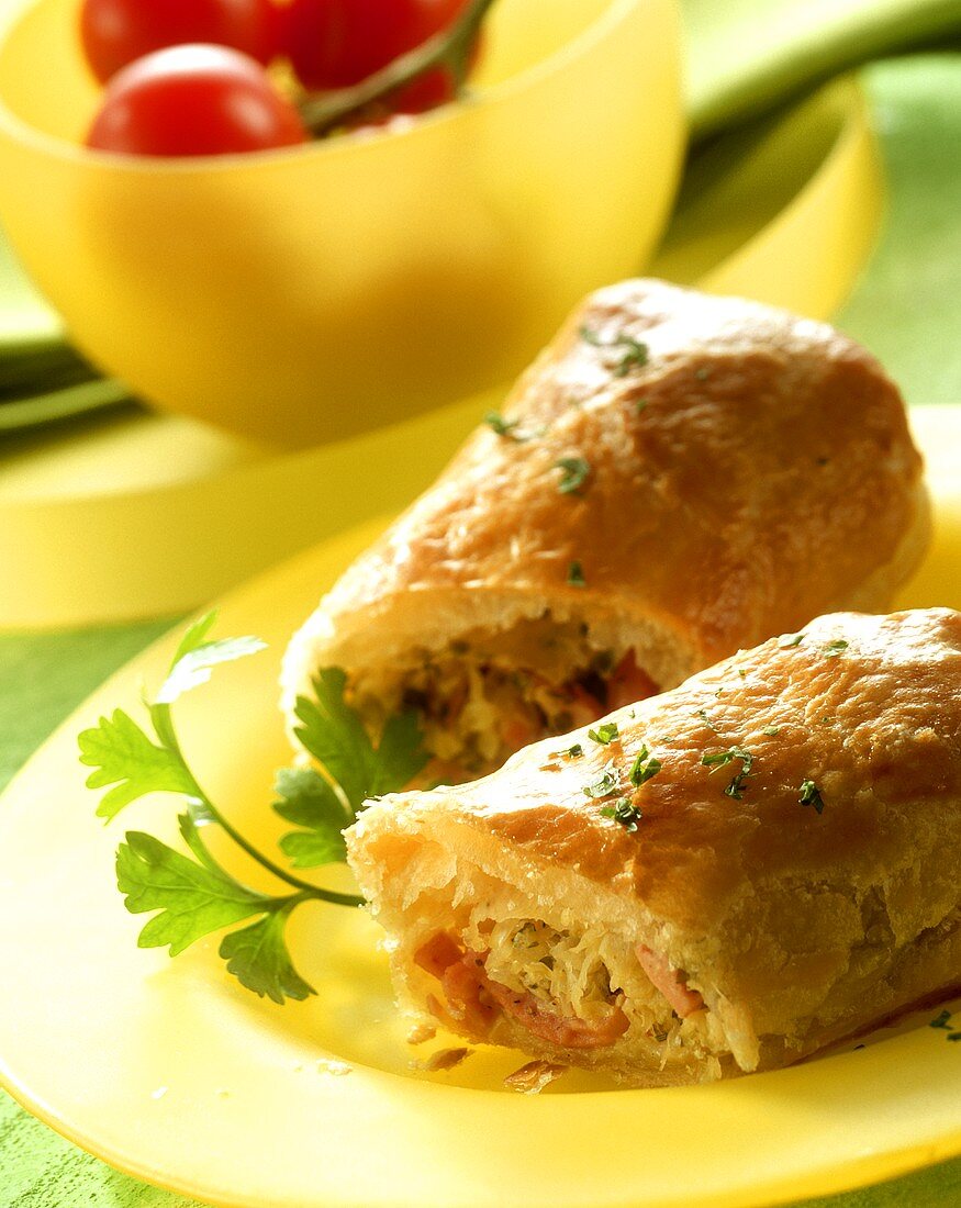 Puff pastry rolls filled with cabbage and sausage 