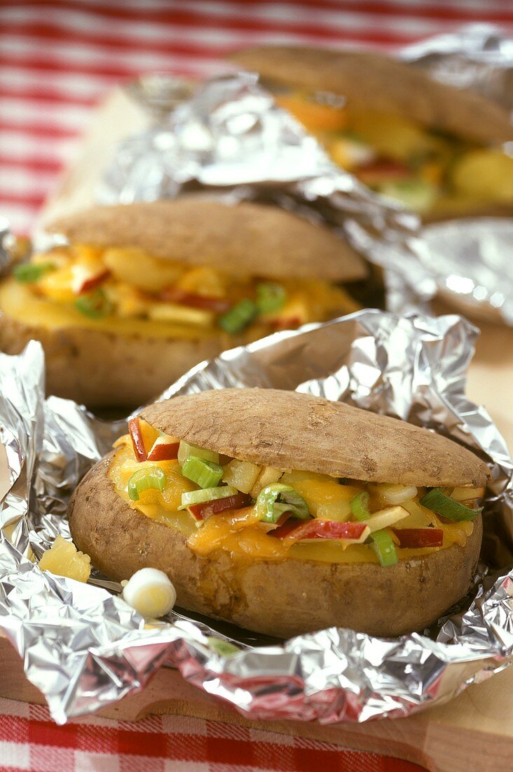 Baked potatoes with vegetable and apple stuffing