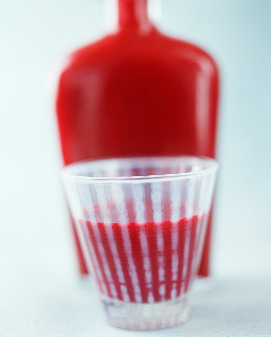 A beaker of beetroot soup