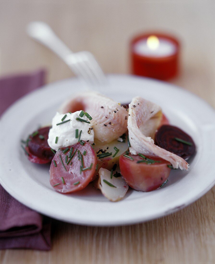 Marinated fish fillets & creamed horseradish on vegetable salad