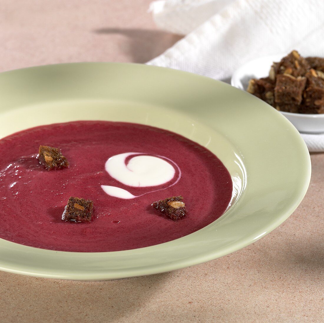 Beetroot soup with wholemeal bread cubes and sour cream
