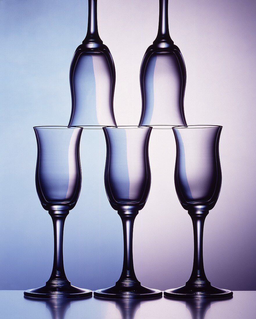 Piled up sherry glasses