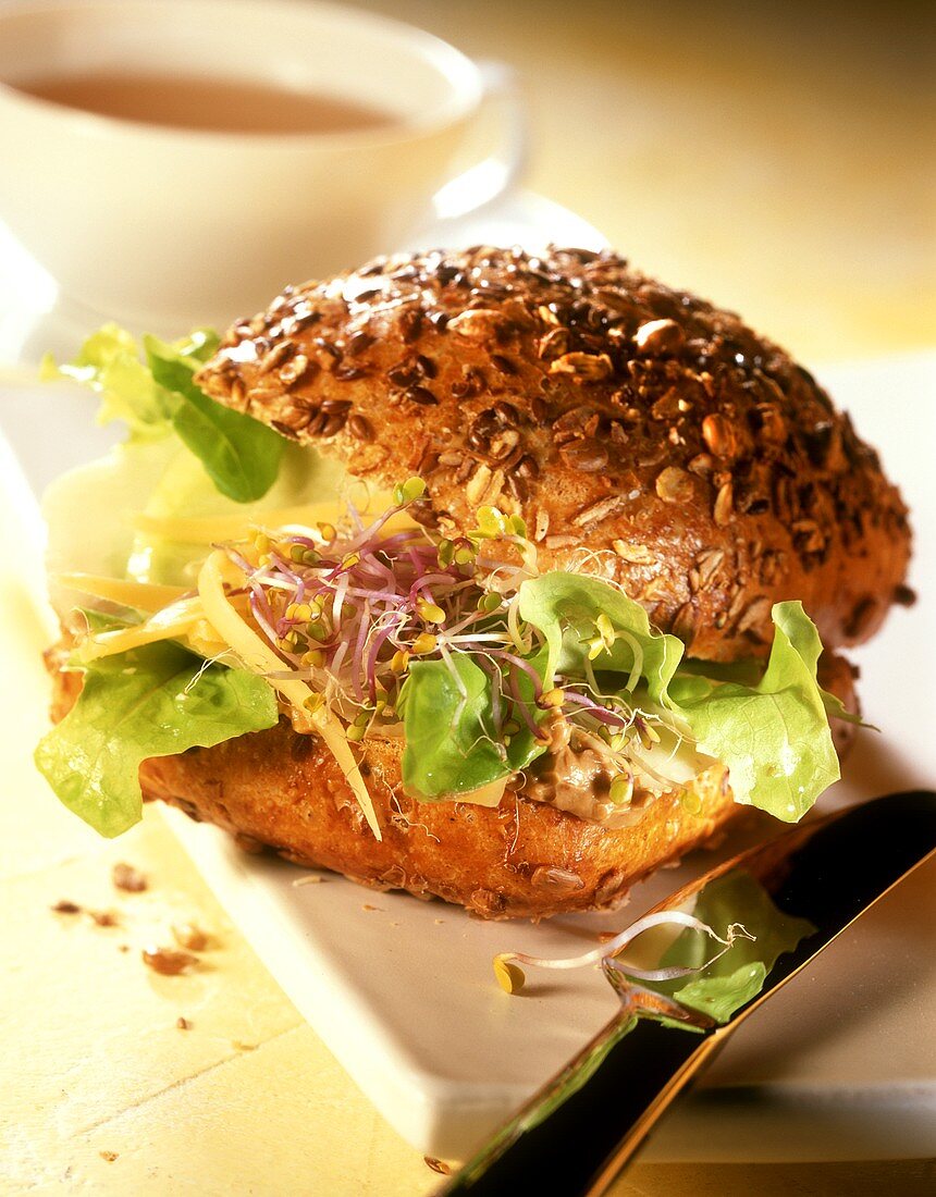 Wholemeal roll with cheese, sprouts & mushroom mousse