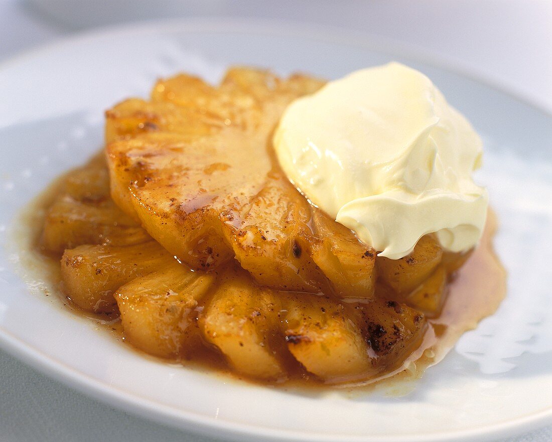 Caramelised pineapple slices with double cream