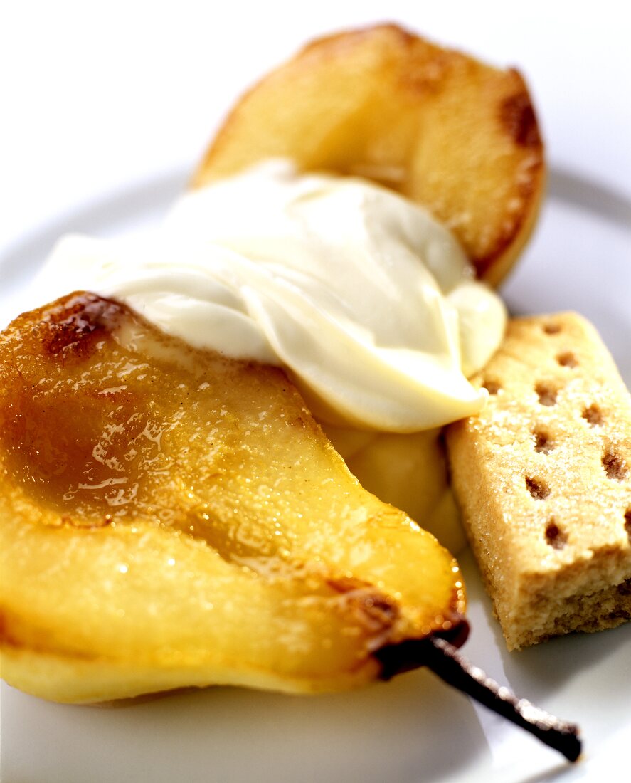 Caramelised pear with cream and biscuit