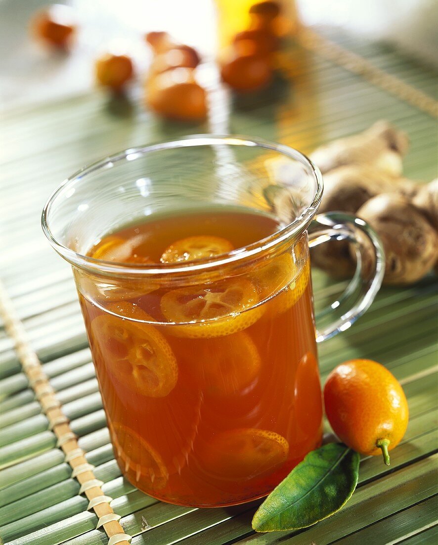 Tea punch with kumquats