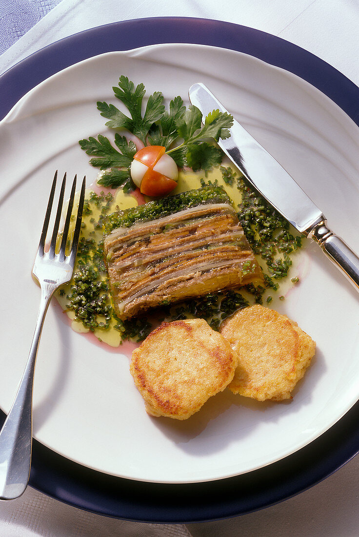 Meat and vegetable terrine with horseradish biscuits