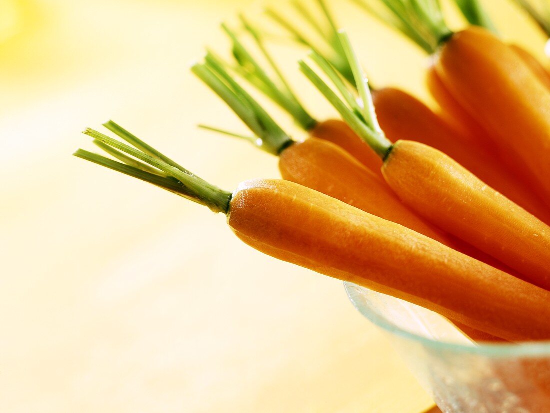 Peeled carrots with tops