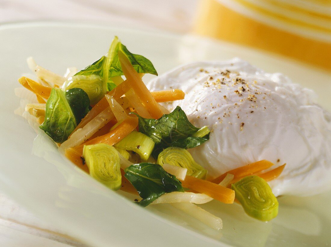 Vegetable ragout with poached egg