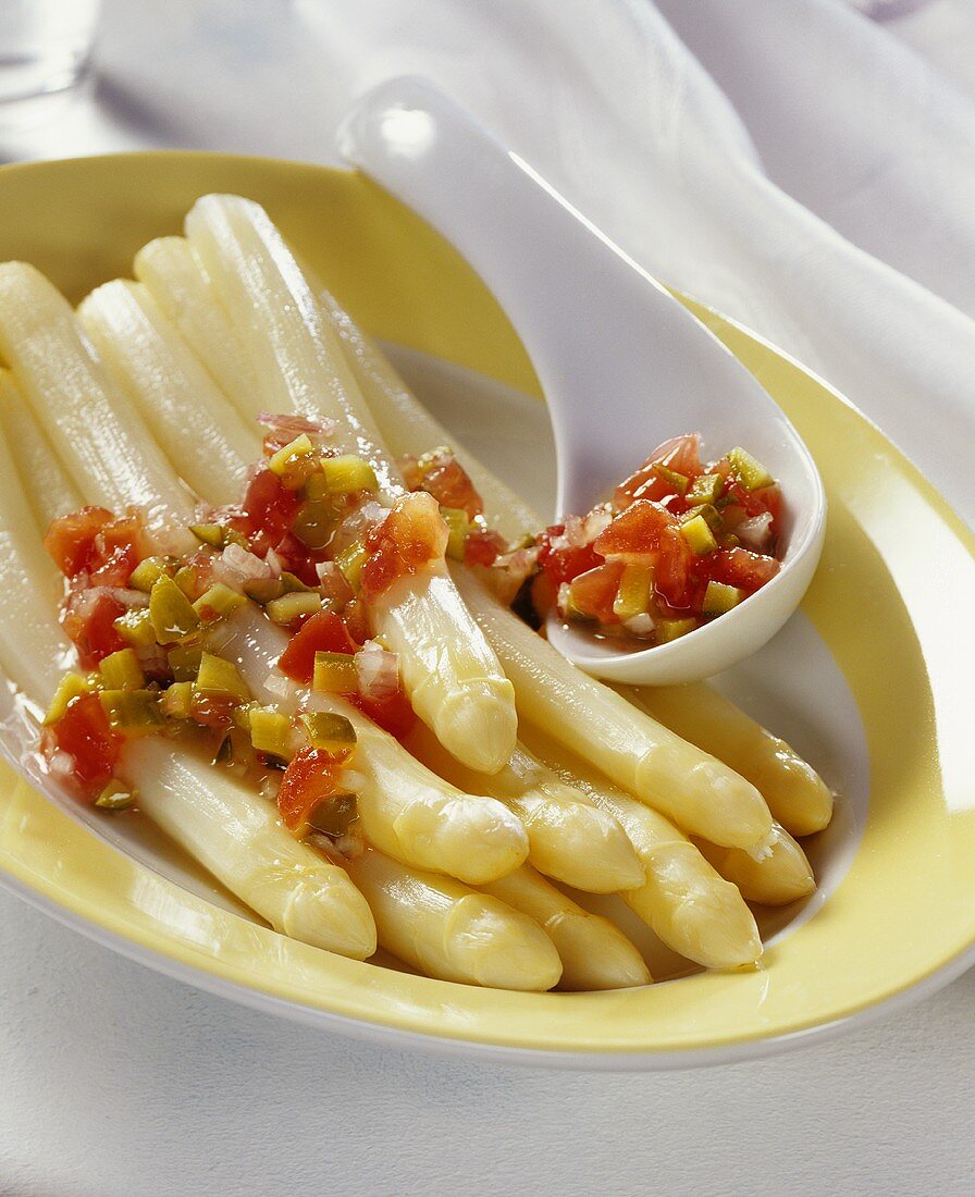 White asparagus with tomato and cucumber relish