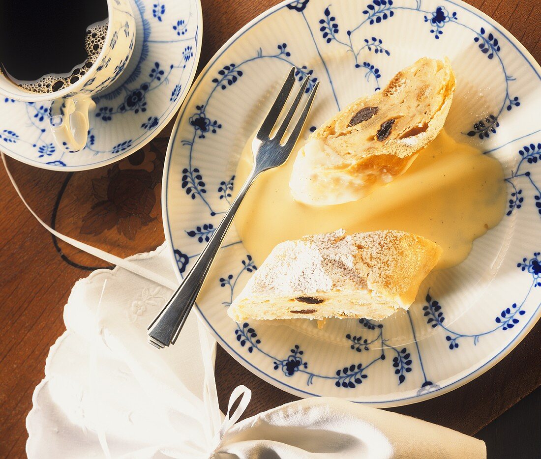 Two pieces of Karlsbad strudel with custard