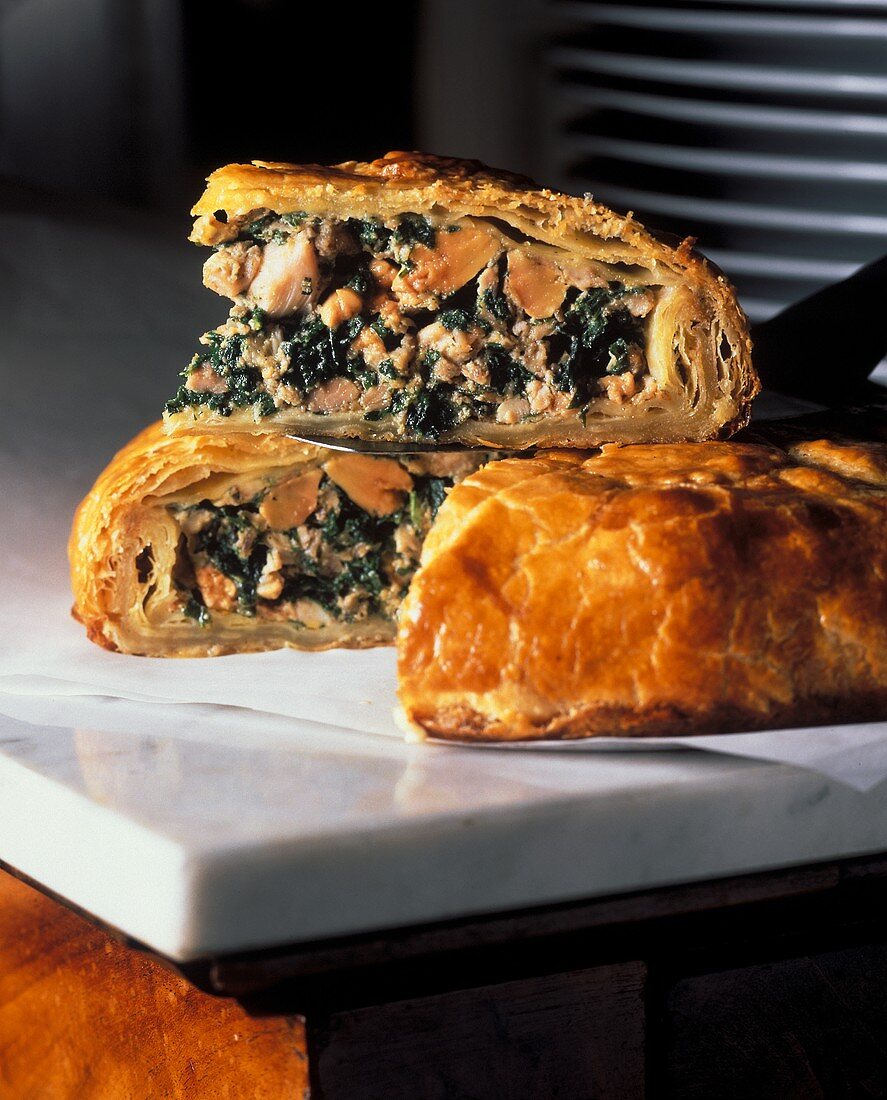 Pie filled with hare, goose liver and spinach