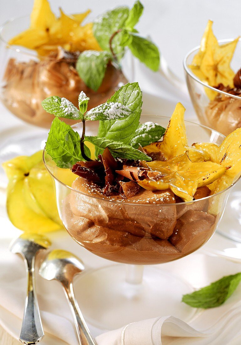 Chocolate mousse with caramelised star fruit slices