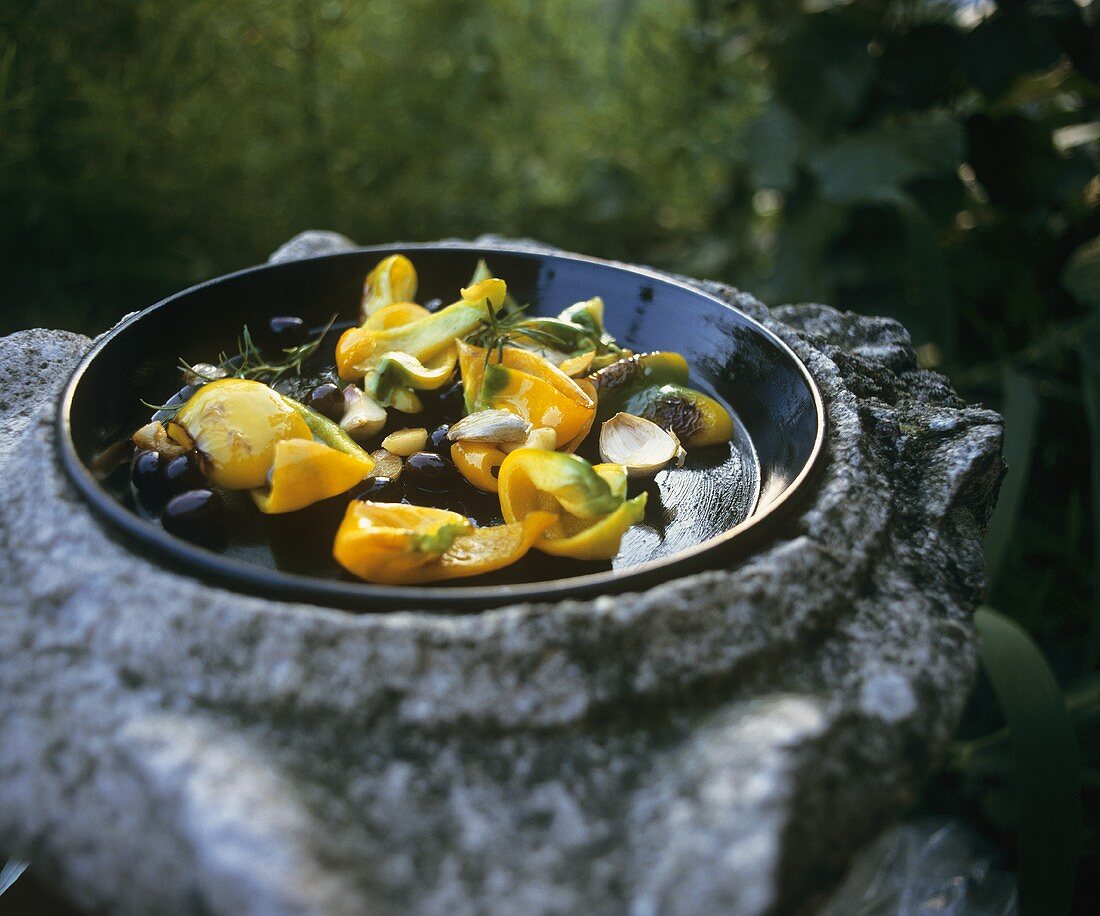 Roasted pepper pieces with garlic and olives