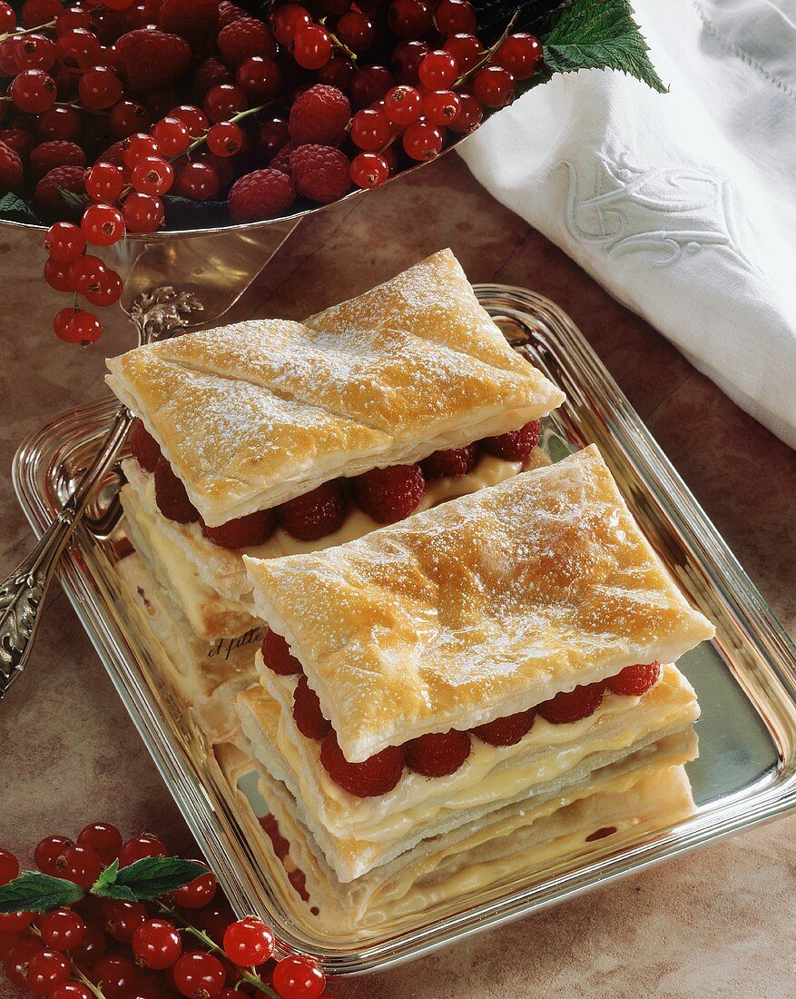 Puff pastries filled with raspberries and custard
