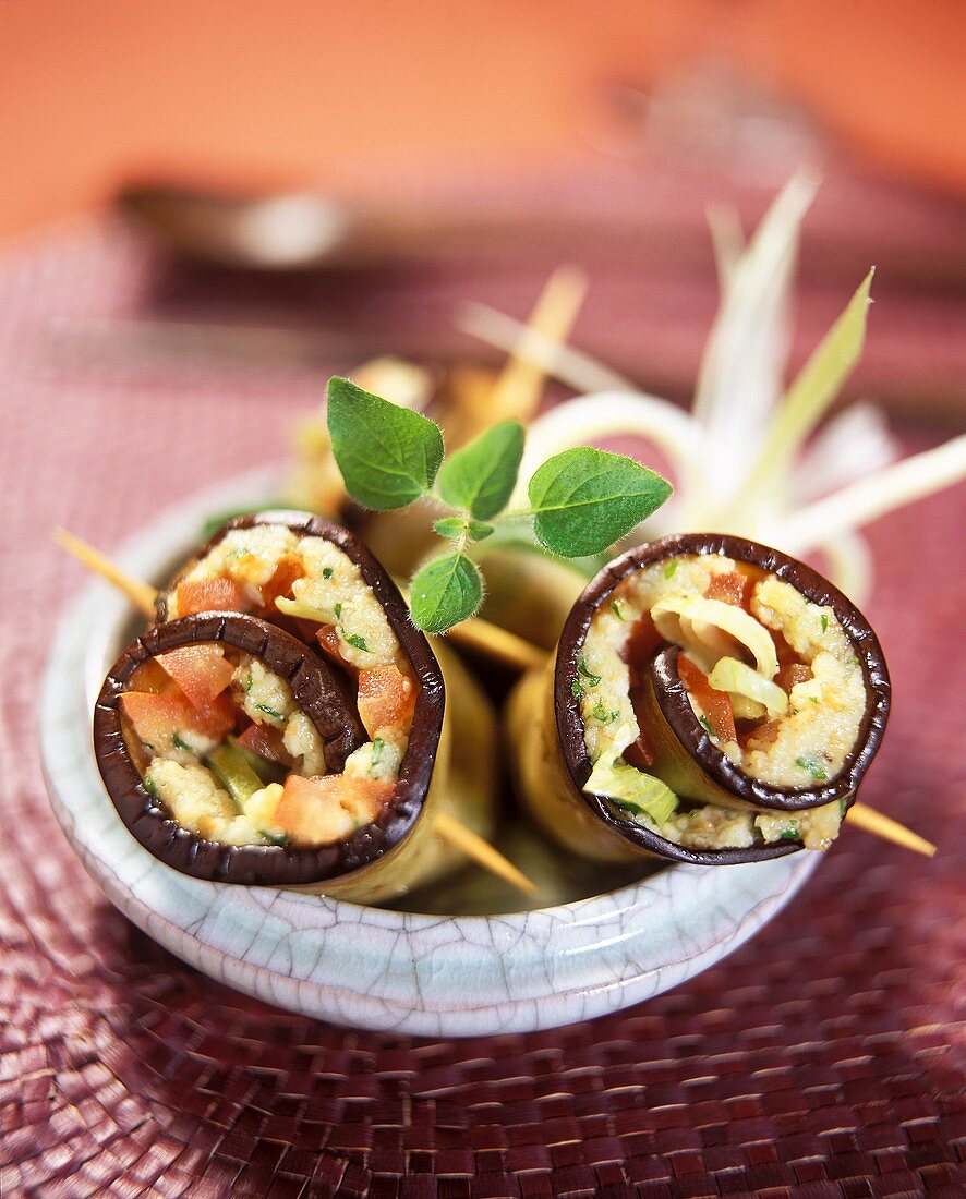 Aubergine roll with cheese and herb filling