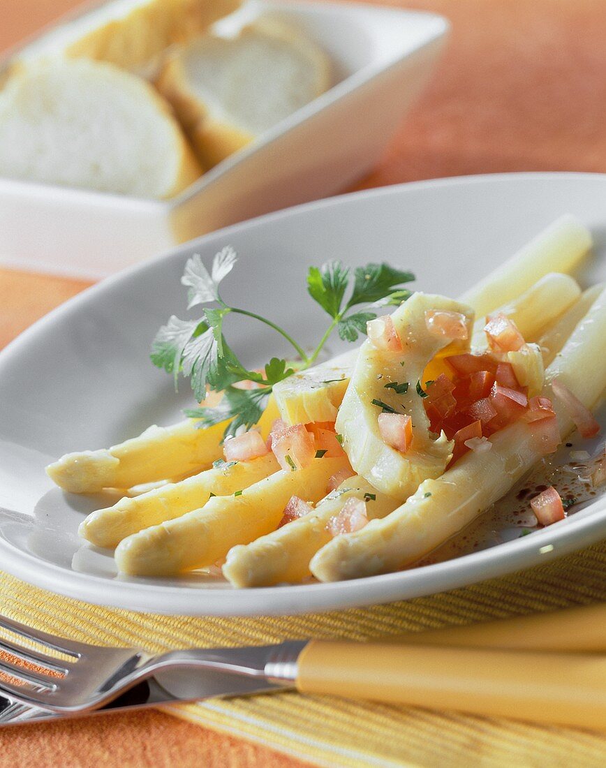 White asparagus with artichoke and tomato vinaigrette