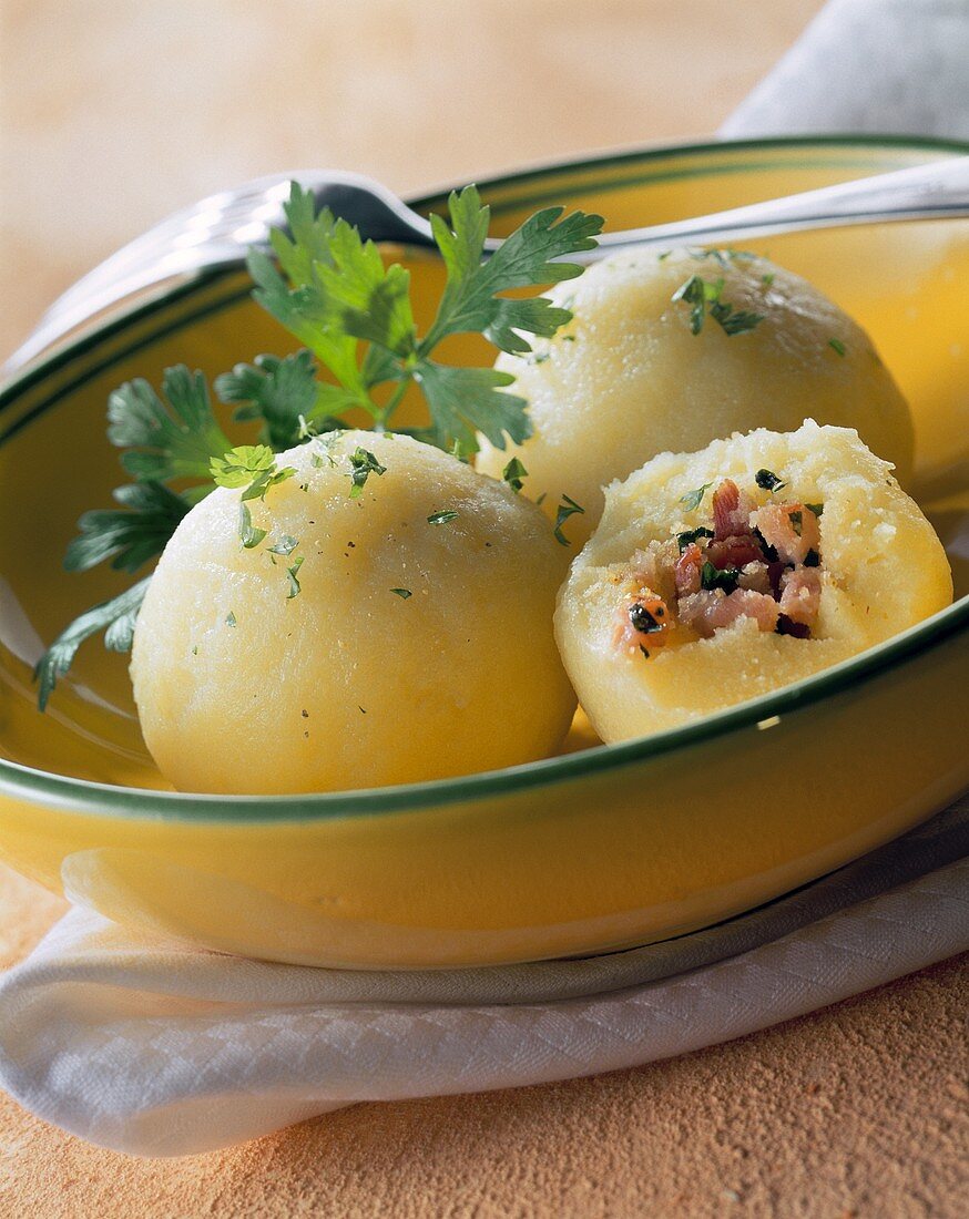 Potato dumplings with ham stuffing