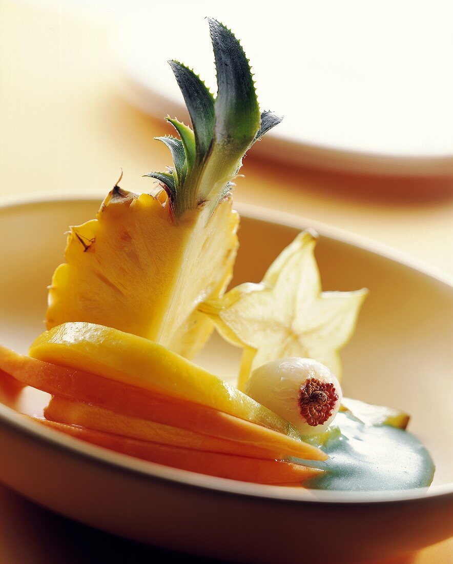 Tropical fruits with Curacao sauce