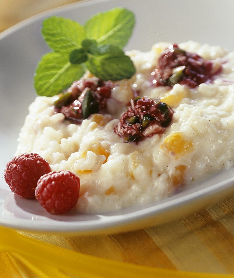 Apricot risotto with raspberry and pistachio sauce