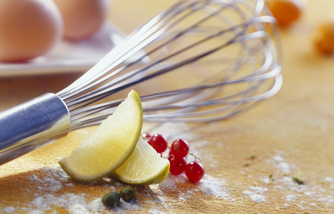 Egg whisk and baking ingredients