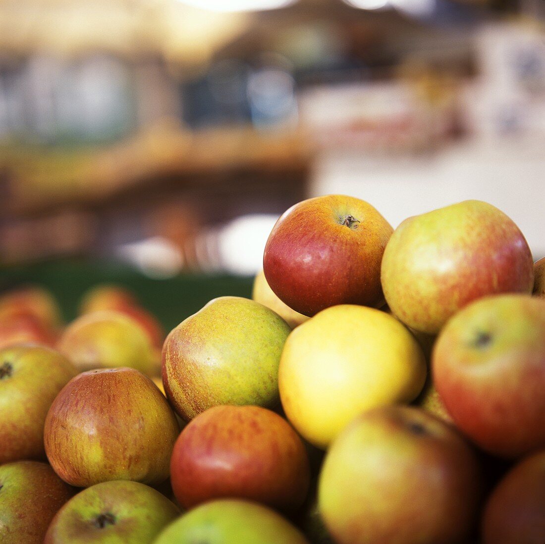 Several apples on fruit stall