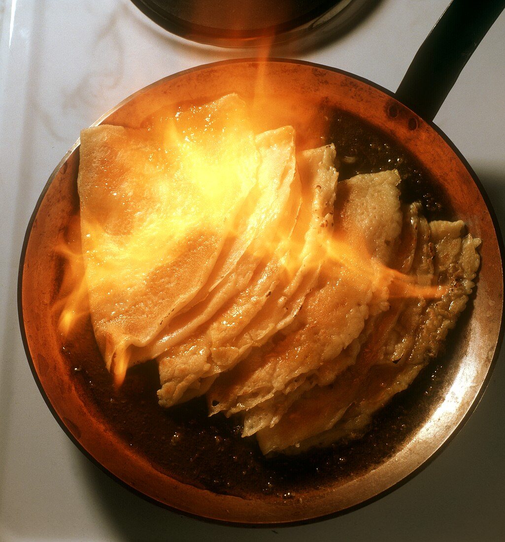 Flambéing crepes suzettes