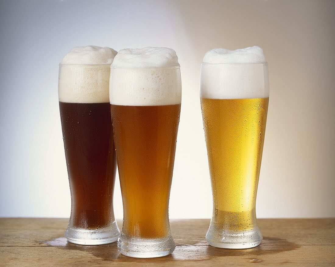 Wheat beers in glasses, dark, Hefe and Kristall