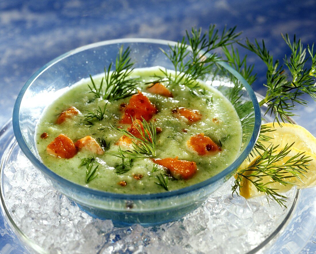 Chilled cucumber soup with fried salmon and dill