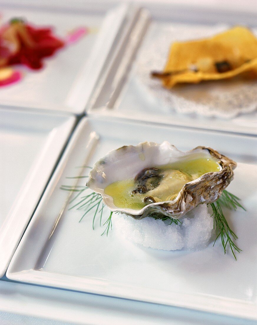 A fresh opened oyster with lime juice