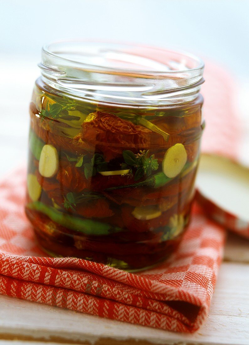 Dried tomatoes in herb oil