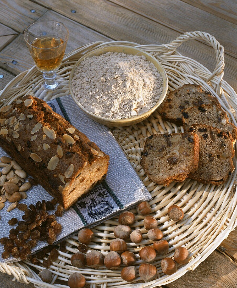 Corsican chestnut cake with ingredients on tray