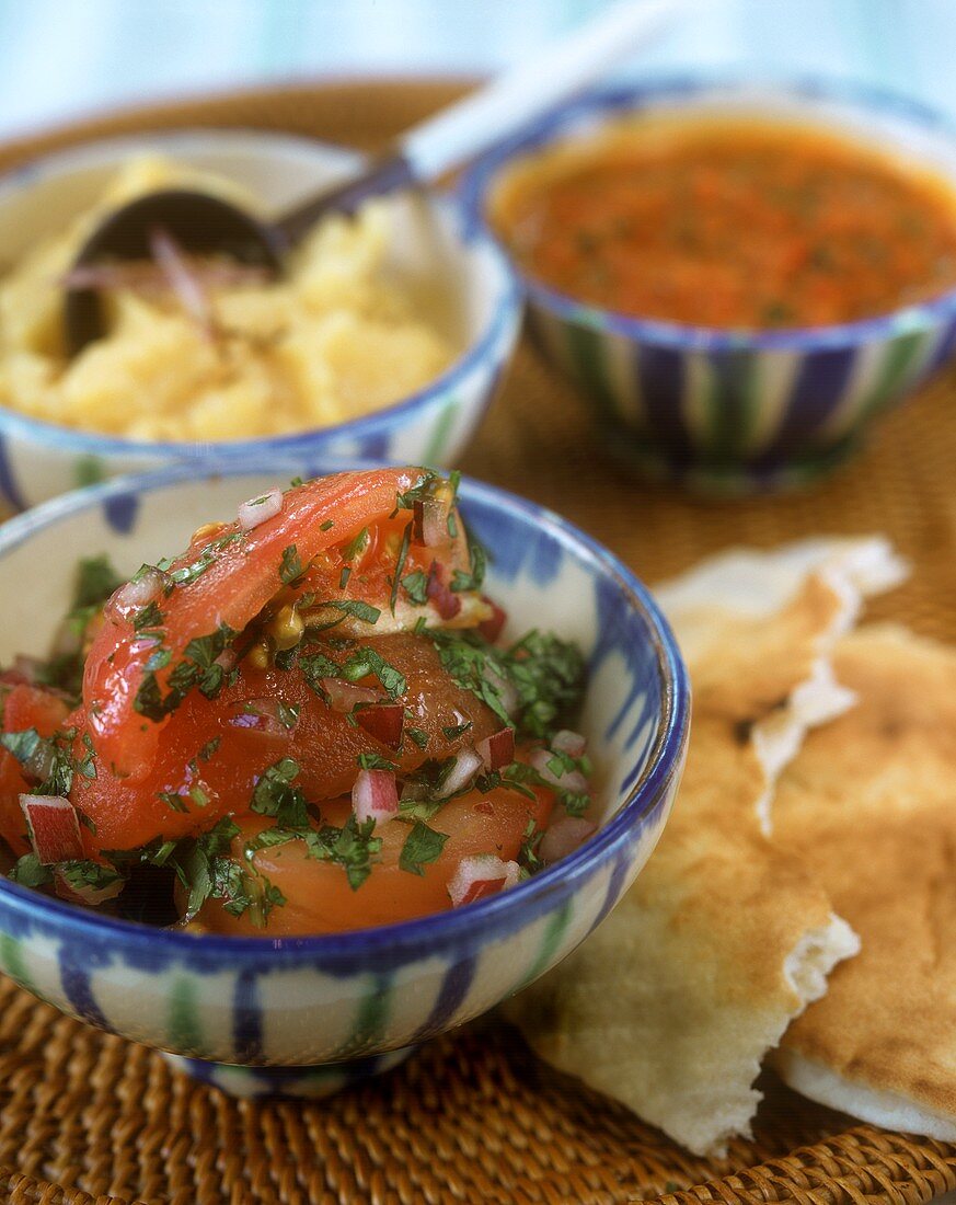 Tomato and herb salad; garlic mashed potatoes