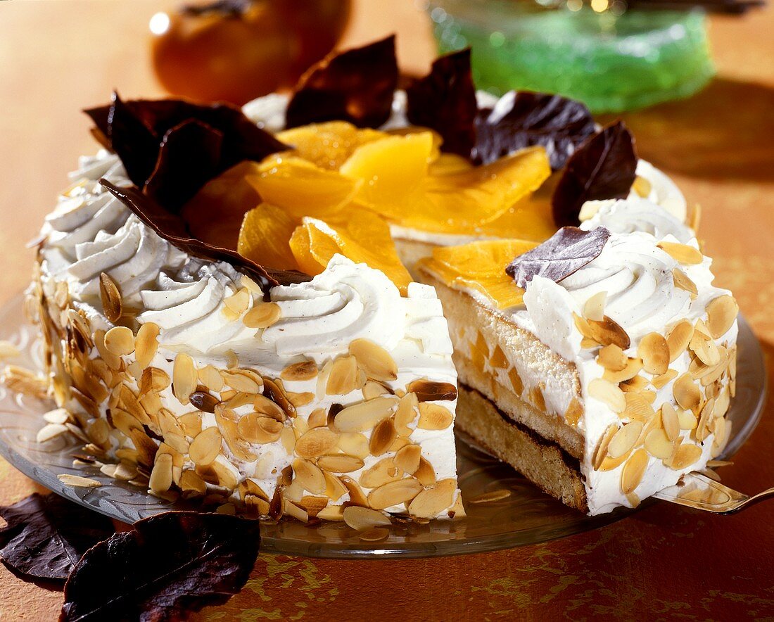 Sharon fruit cream gateau with chocolate leaves