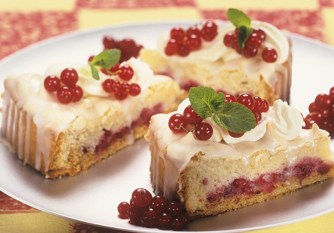 Redcurrant cake, three slices on a platter
