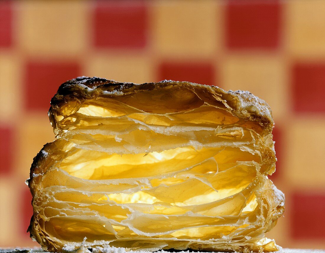 A piece of puff pastry, cut through