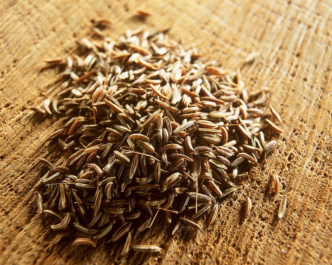 Caraway on brown background