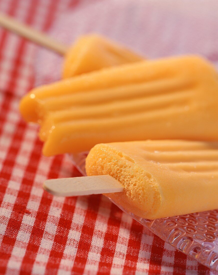 Mango ice cream on a stick
