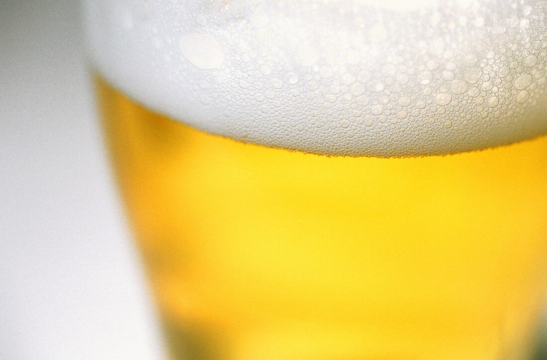 A glass of lager (close-up)