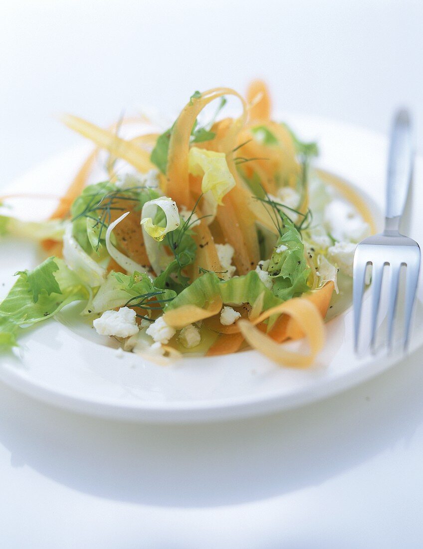 Carrot salad (curly carrots) with sheep's cheese