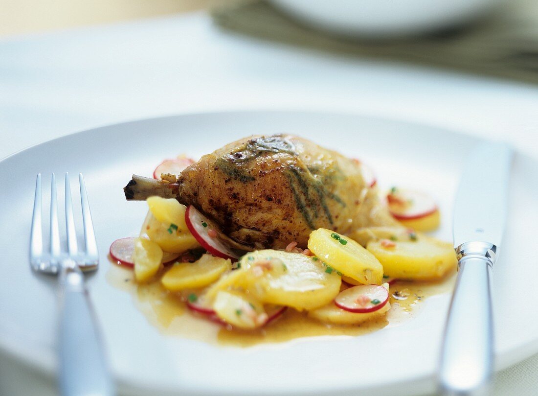 Chicken with herbs from the oven with potato salad