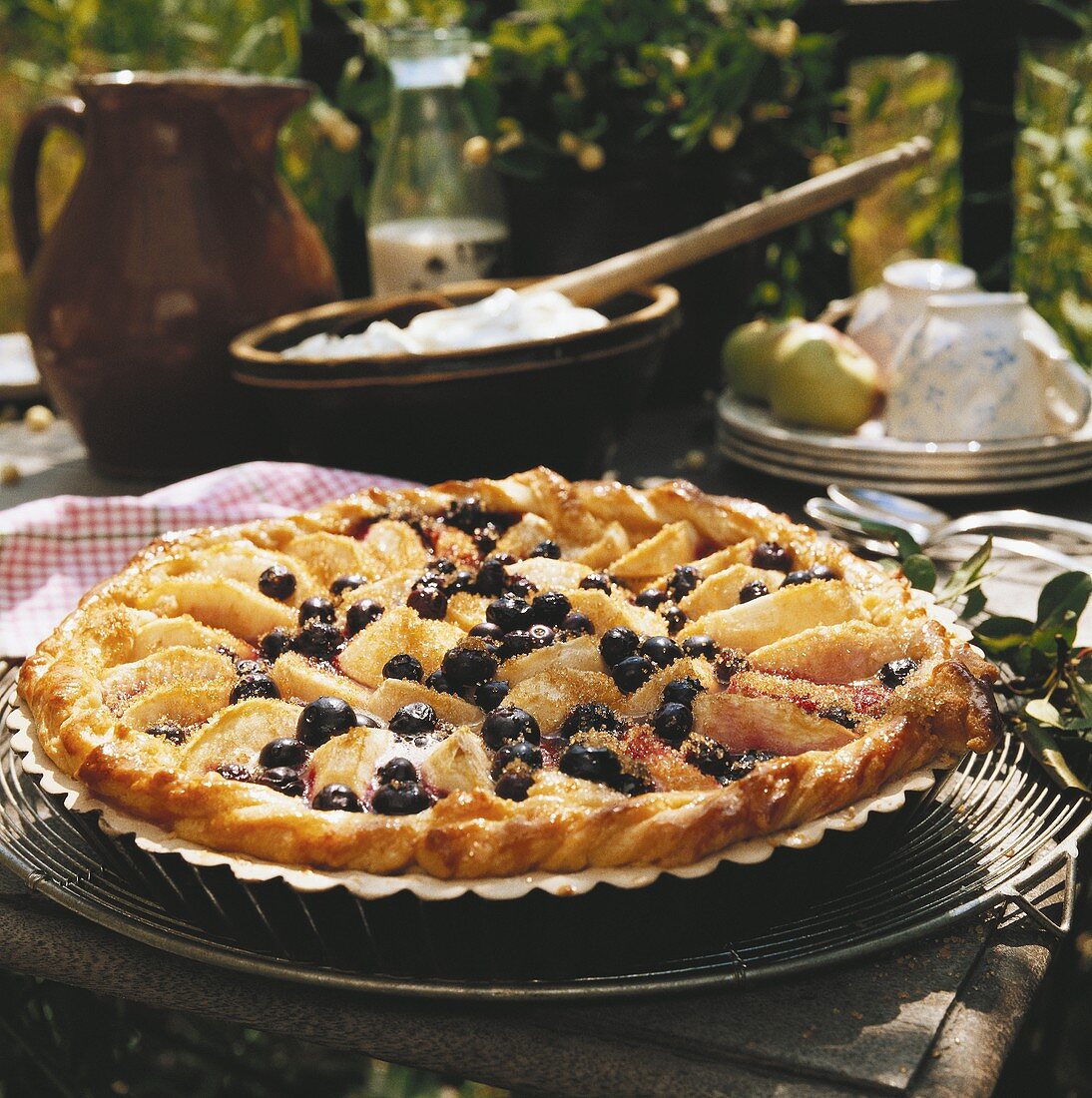 Apple tart with blueberries