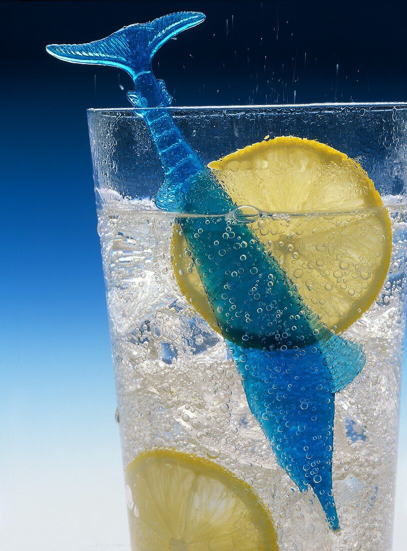 A glass of mineral water with lemon slices