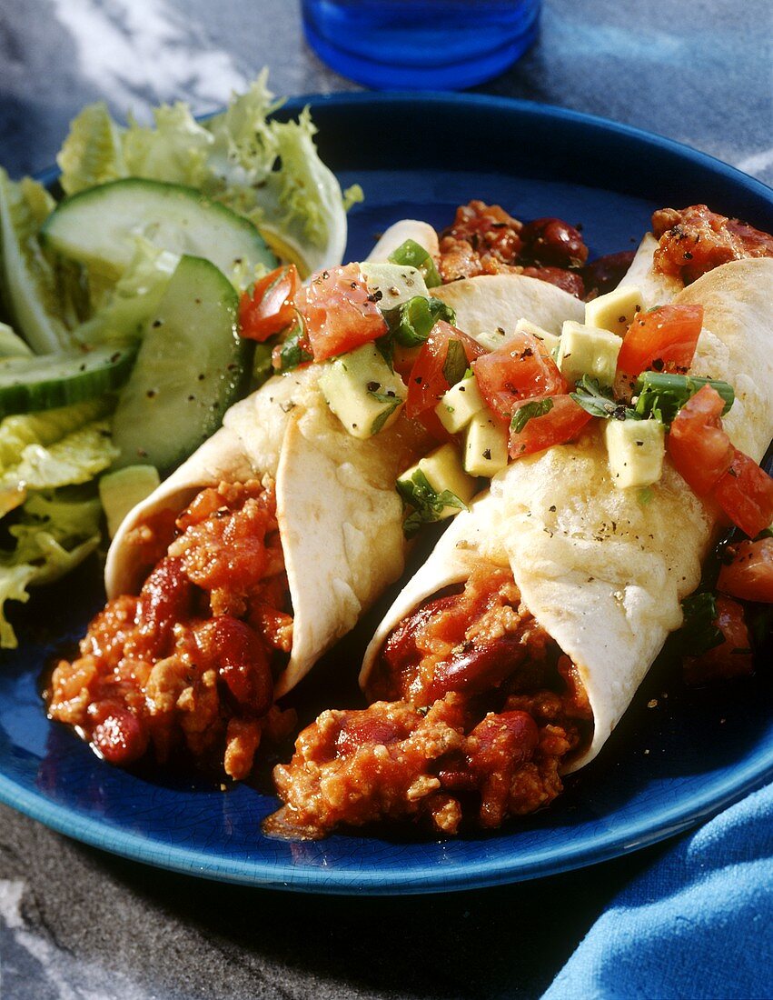 Mexican enchiladas with mince and bean filling