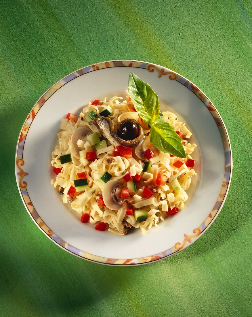 Pasta salad with vegetables and anchovies