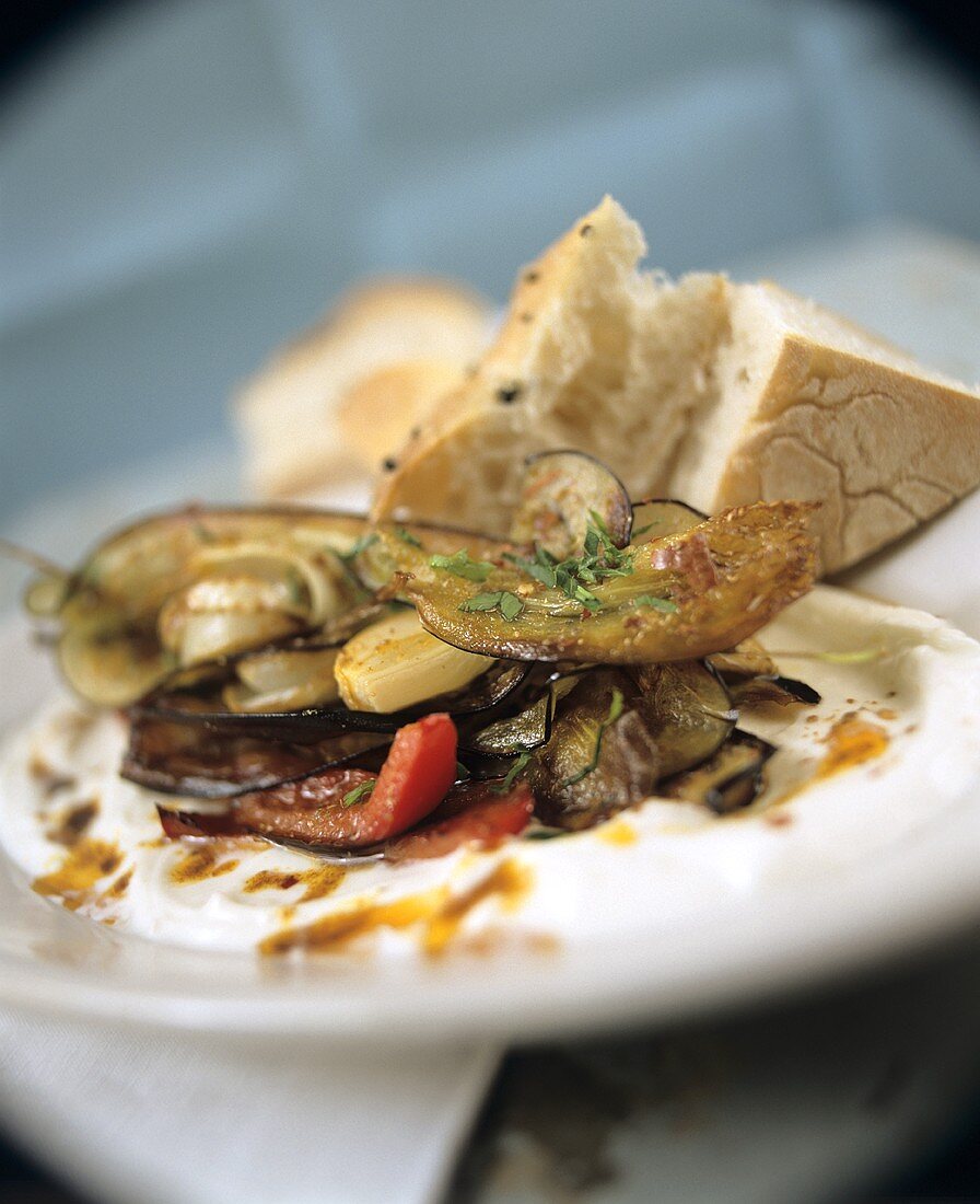 Roasted aubergines and peppers on yoghurt