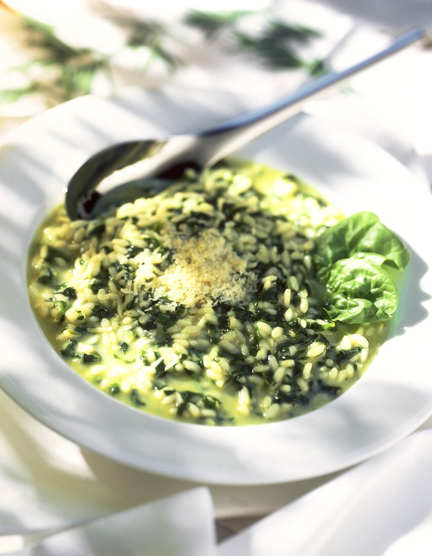 Rice soup with spinach and Parmesan