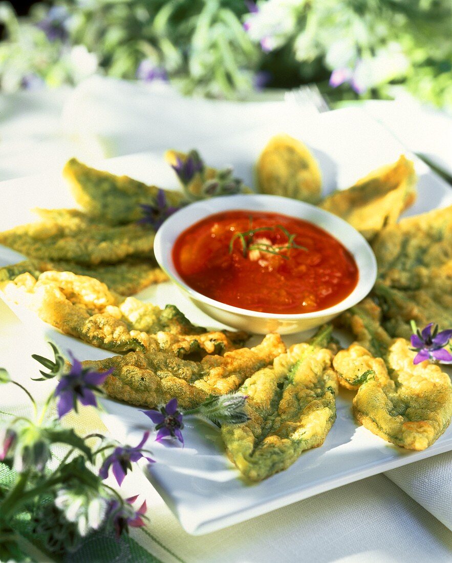 Spinach tempura with tomato dip